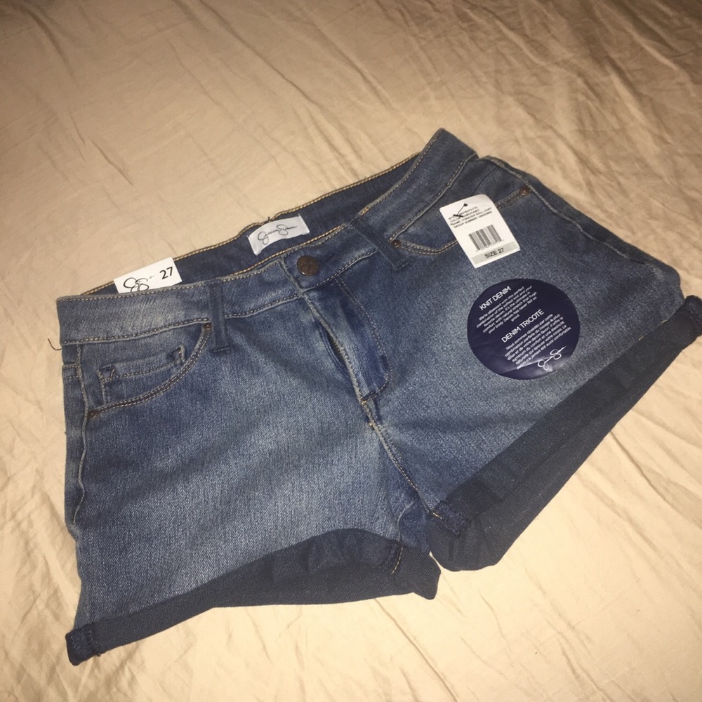 Jessica Simpson “Forever Roll Cuff” jean shorts.